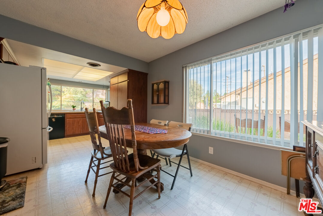 1637 Downing Street Simi Valley, CA 93065 - Photo 16 of 26 a view of a dining room with furniture window and outside view