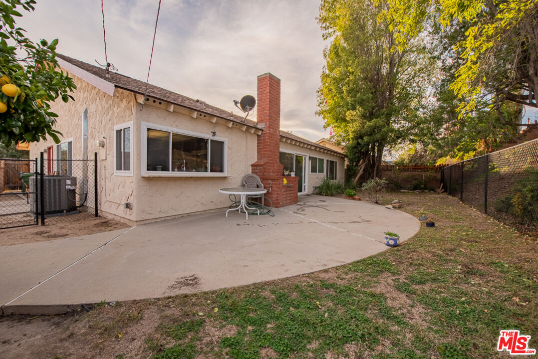 1637 Downing Street Simi Valley, CA 93065 - Photo 23 of 26 a front view of a house with garden