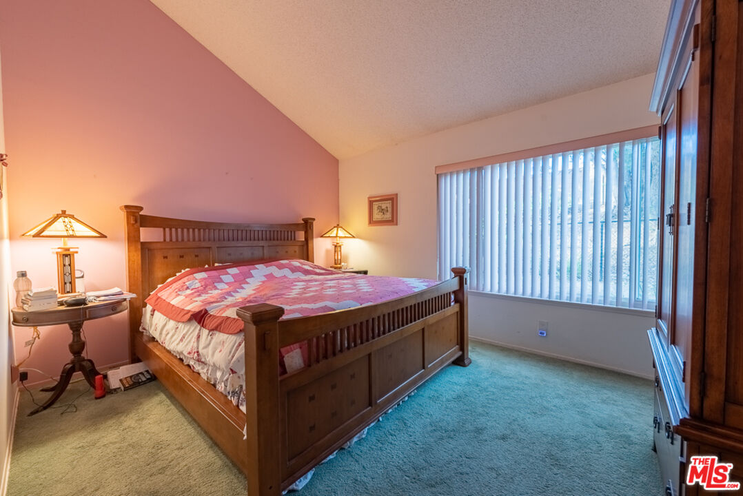 1637 Downing Street Simi Valley, CA 93065 - Photo 6 of 26 a bed sitting in a room next to a window