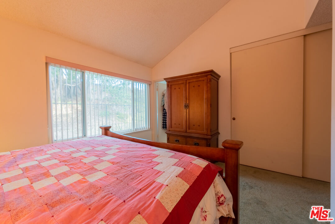 1637 Downing Street Simi Valley, CA 93065 - Photo 7 of 26 a bedroom with a bed and a window