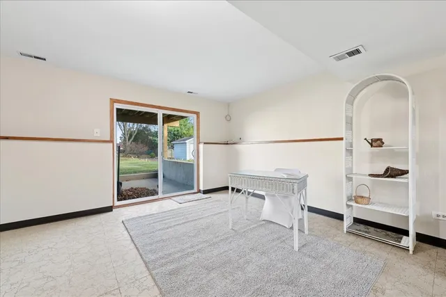 a view of livingroom with furniture and windows