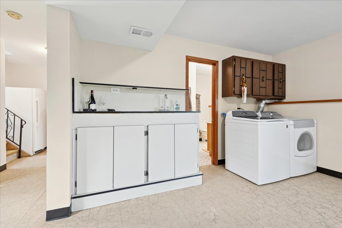 23565 North Park Road Lake Zurich, IL 60047 - Photo 17 of 26 a utility room with dryer and washer