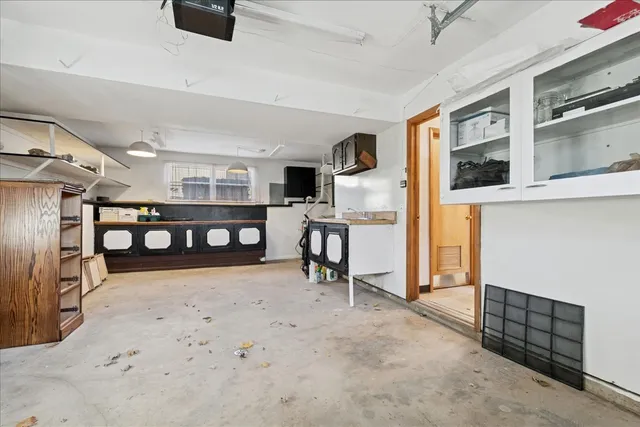 a view of living room with furniture and a flat screen tv