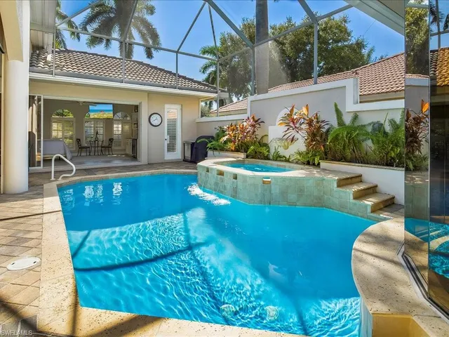 a view of a chairs and table in the patio