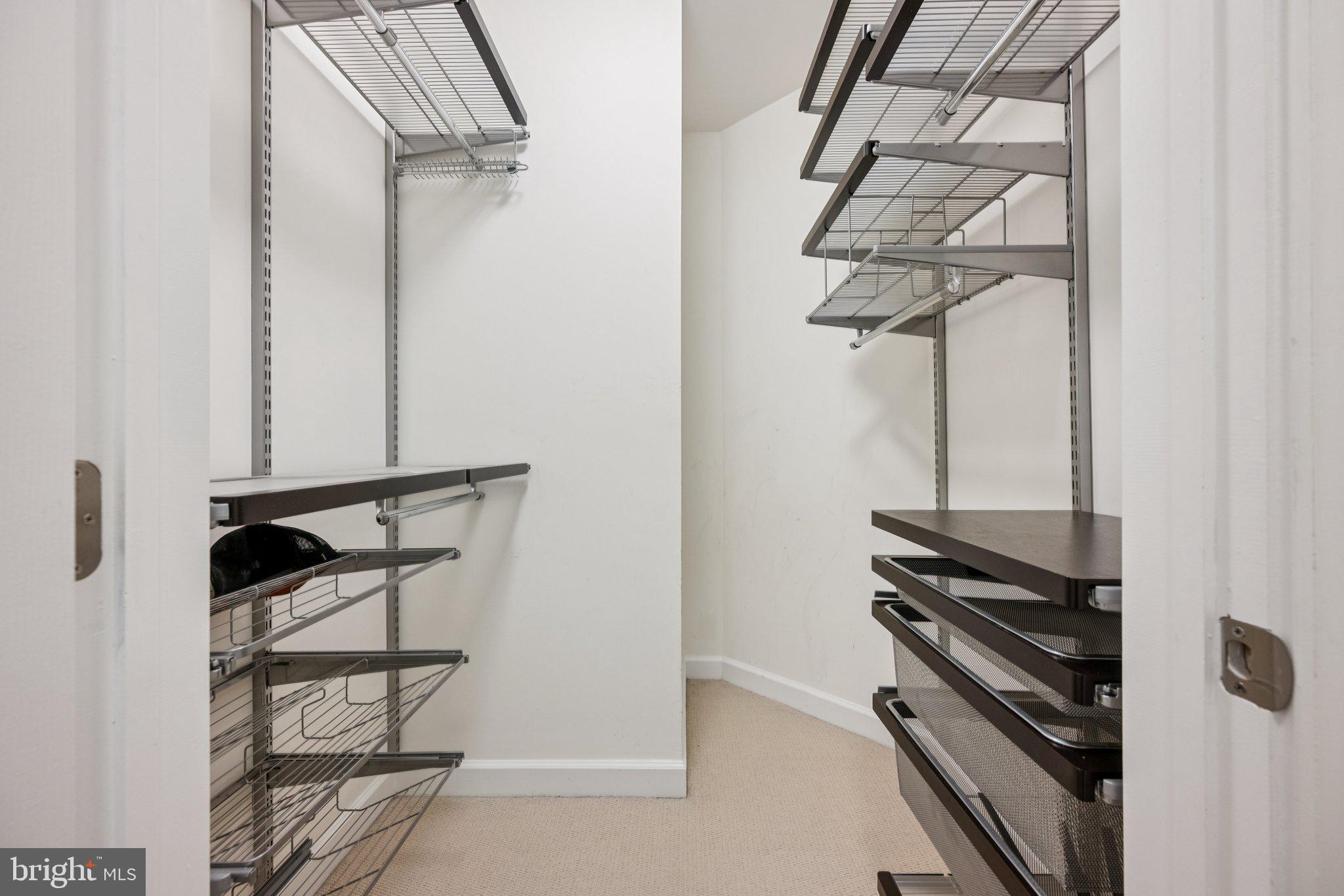 2101 North Monroe Street, Unit 107 Arlington, VA 22207 - Photo 18 of 24 a view of staircase with white walls and railing