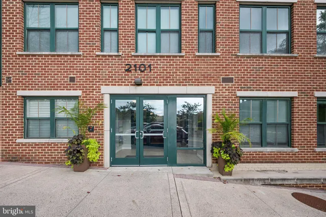 a view of a cars parked in front of a building