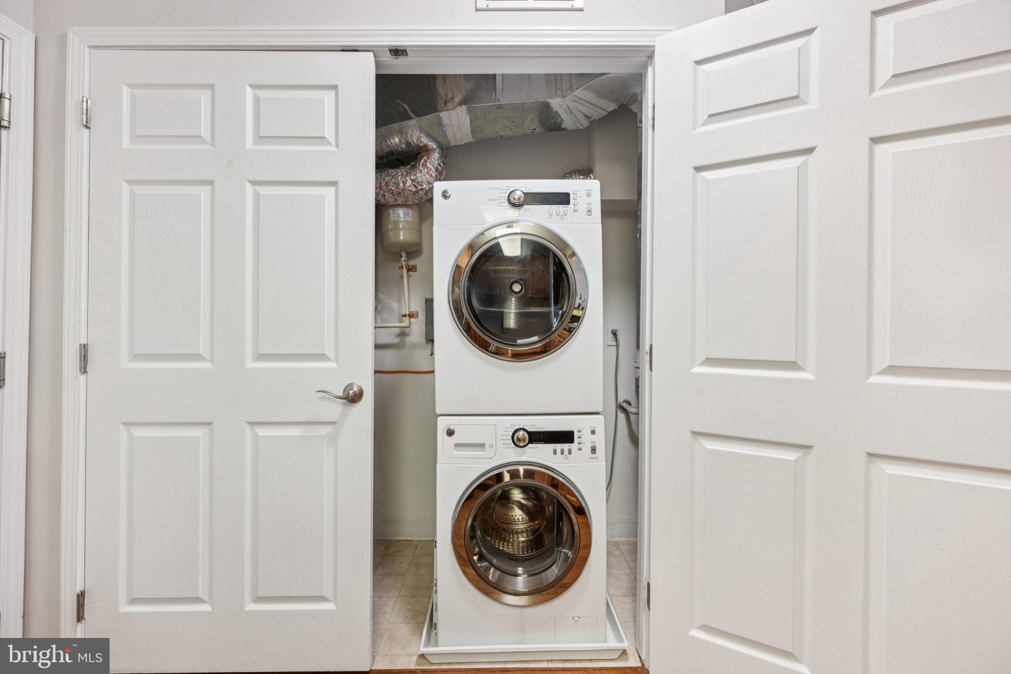 2101 North Monroe Street, Unit 107 Arlington, VA 22207 - Photo 24 of 24 a utility room with dryer and washer