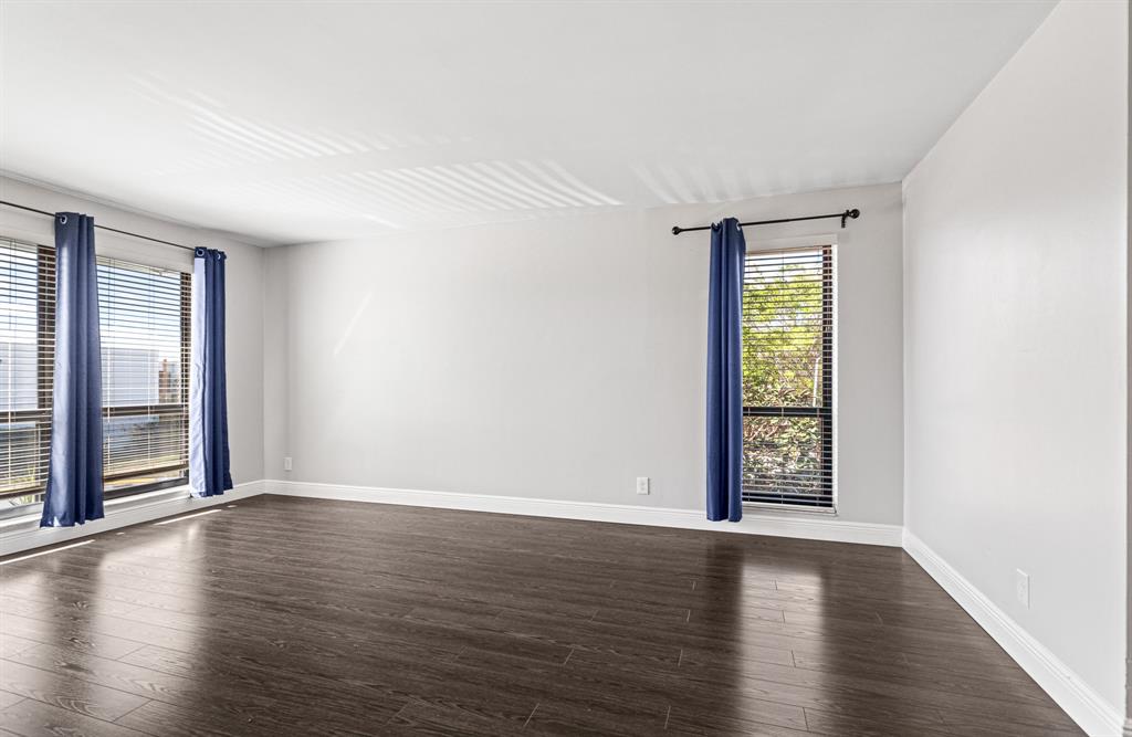 502 Osprey Drive, Unit 17C Delray Beach, FL 33444 - Photo 26 of 41 wooden floor in an empty room with a window