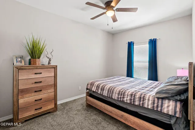 an empty room with closet area