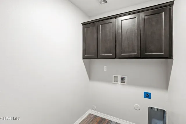 a bathroom with a sink toilet and mirror