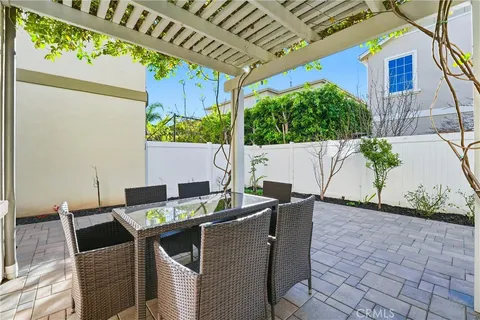 a outdoor dining space with furniture