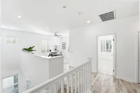 a view of kitchen and kitchen with wooden floor