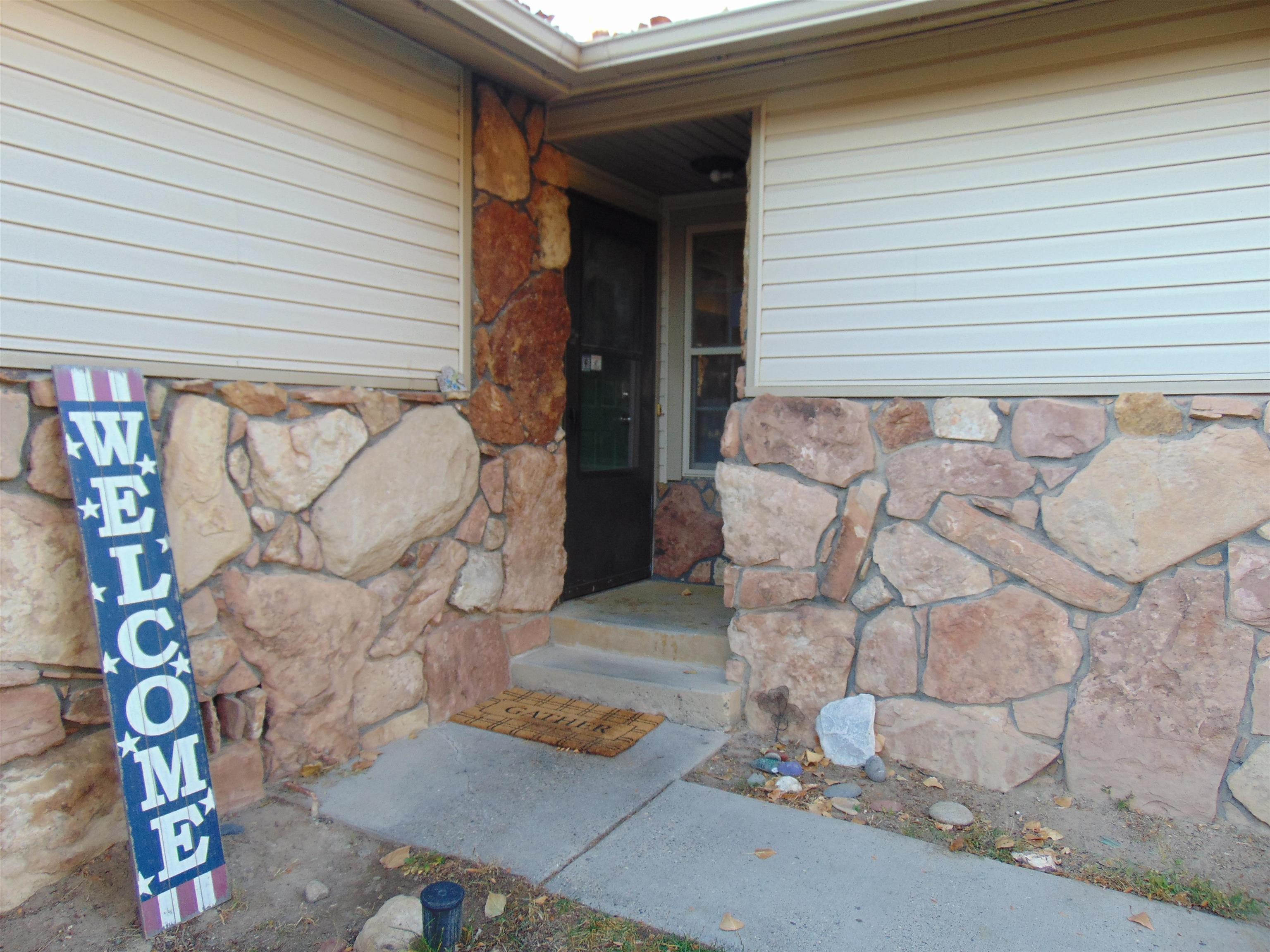321 North Ash Street Fruita, CO 81521 - Photo 3 of 24 a view of outdoor space and parking