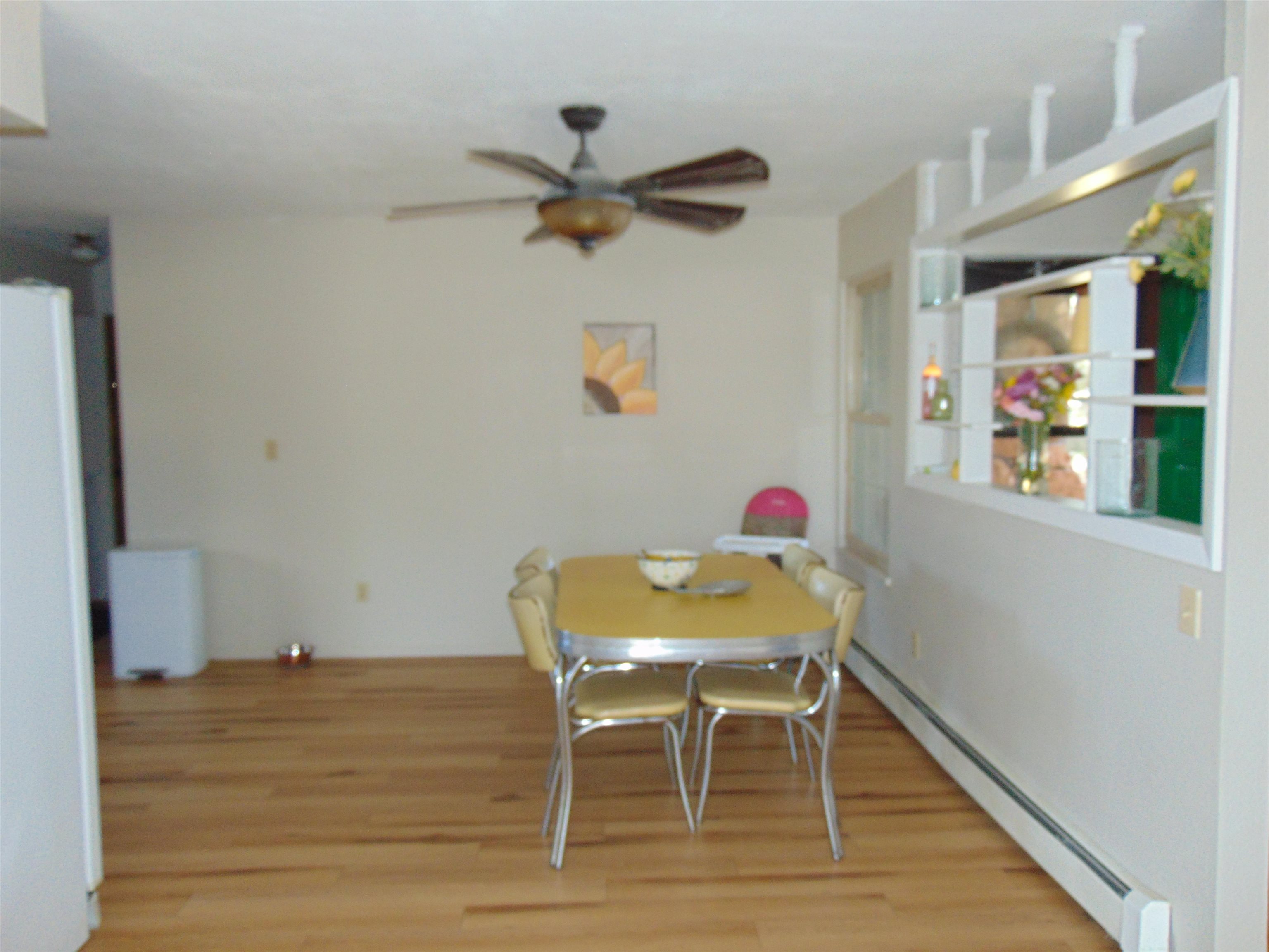 321 North Ash Street Fruita, CO 81521 - Photo 8 of 24 a view of a dining room with furniture and a table