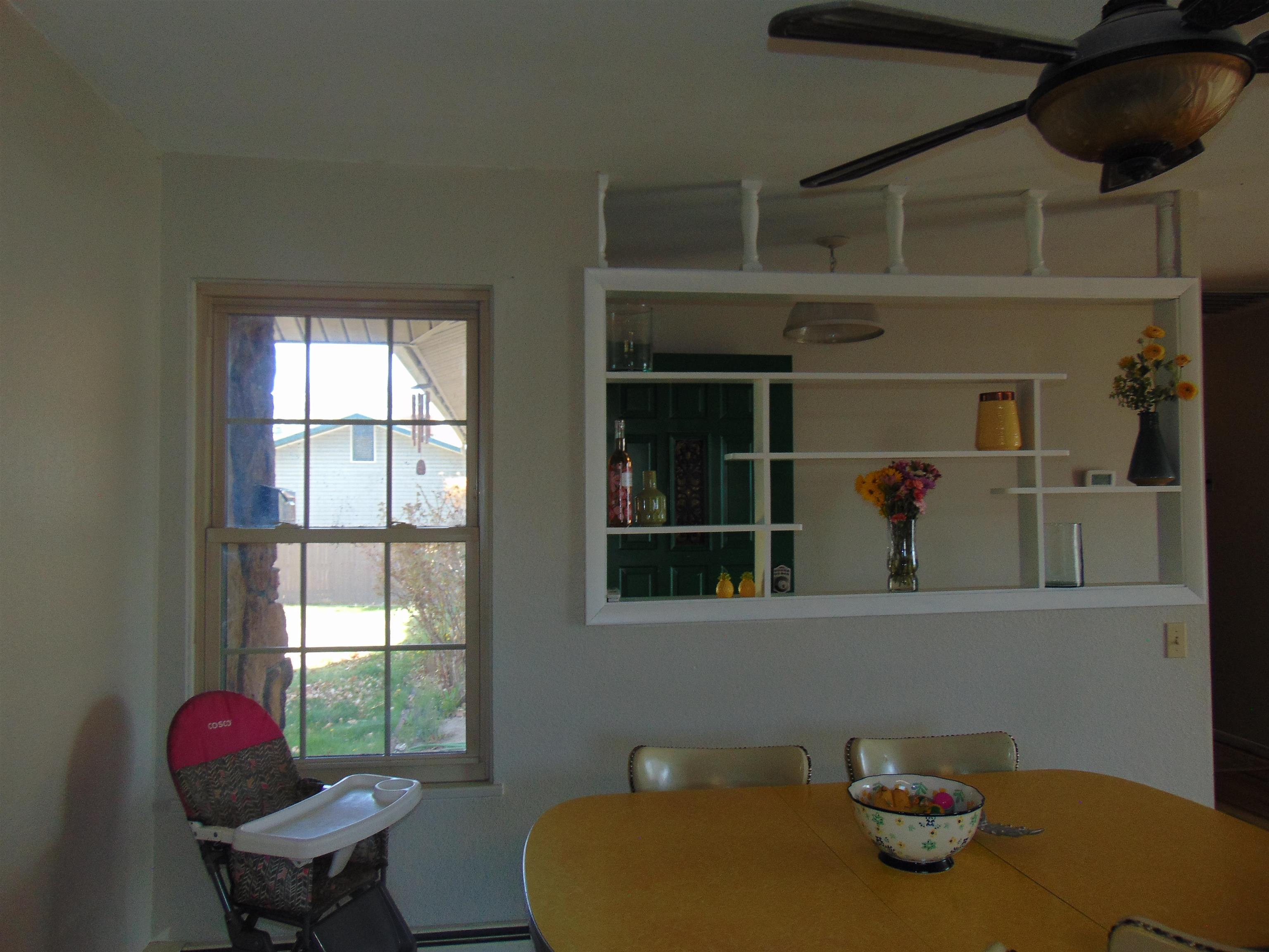 321 North Ash Street Fruita, CO 81521 - Photo 9 of 24 a living room with furniture and a window