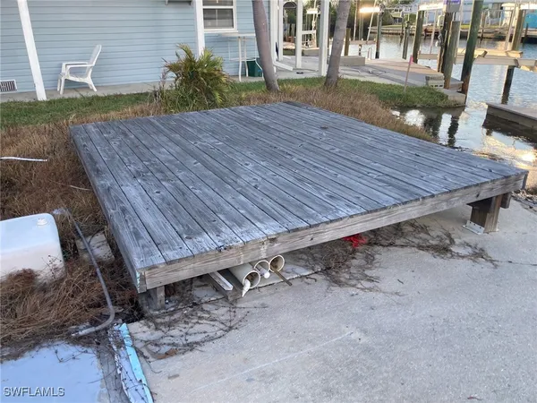 a view of a lake with sitting area