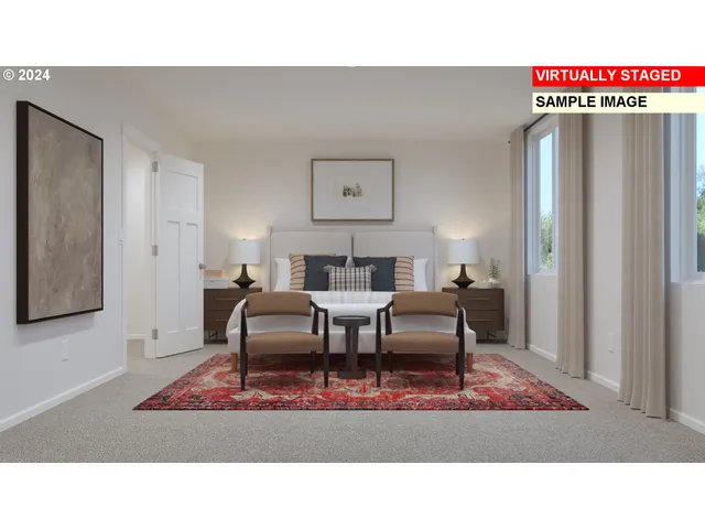 a living room with furniture and a rug