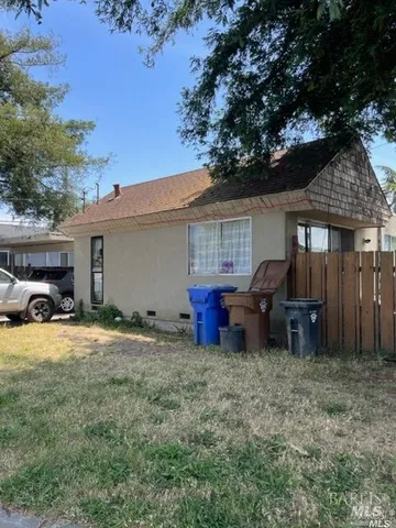 a view of a house with a patio