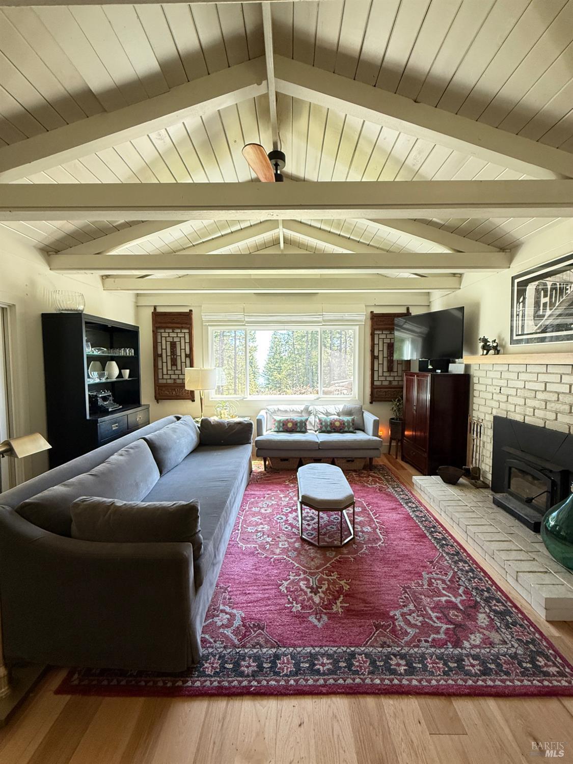 28800 Seaview Road Cazadero, CA 95421 - Photo 1 of 14 a living room with furniture and a fireplace