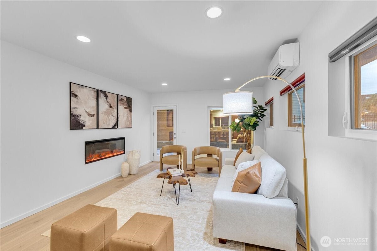 1722 Northwest 60th Street Seattle, WA 98107 - Photo 12 of 37 a living room with furniture and a flat screen tv