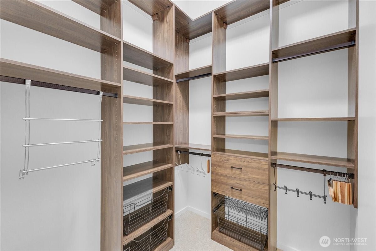 1722 Northwest 60th Street Seattle, WA 98107 - Photo 20 of 37 a view of walk in closet with empty racks