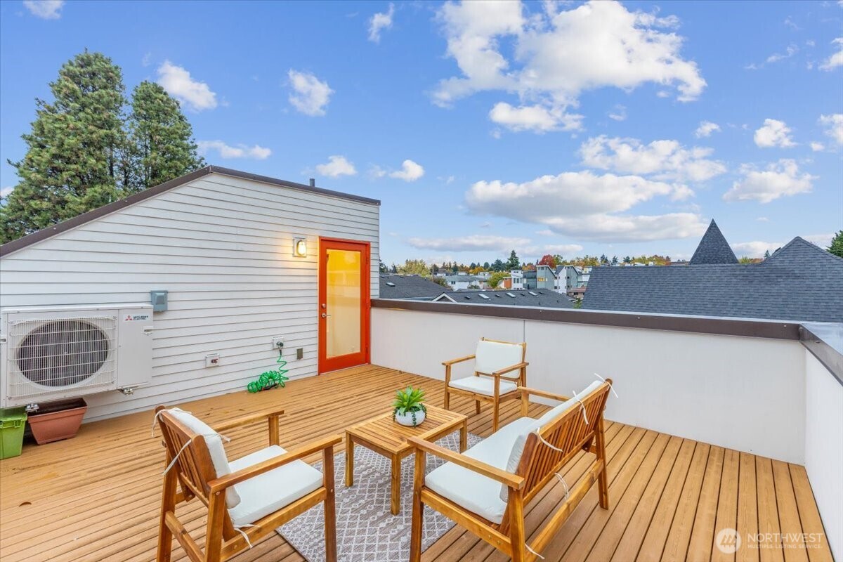 1722 Northwest 60th Street Seattle, WA 98107 - Photo 2 of 37 a terrace of a house with outdoor seating