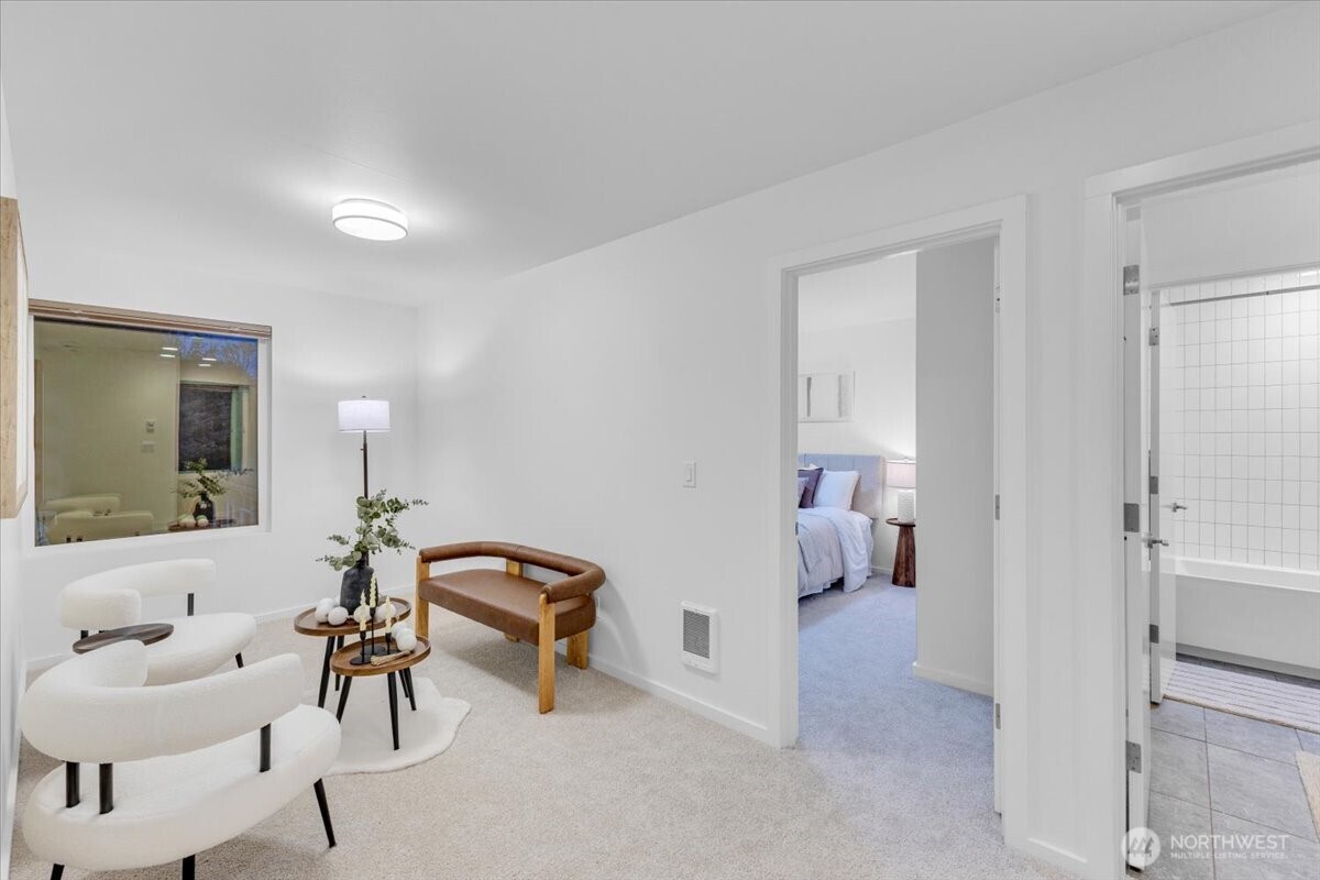 1722 Northwest 60th Street Seattle, WA 98107 - Photo 29 of 37 a living room with furniture and a mirror