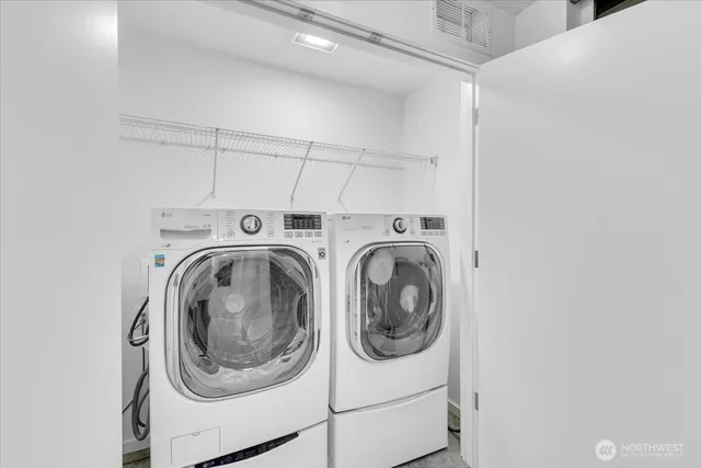 a utility room with dryer and washer