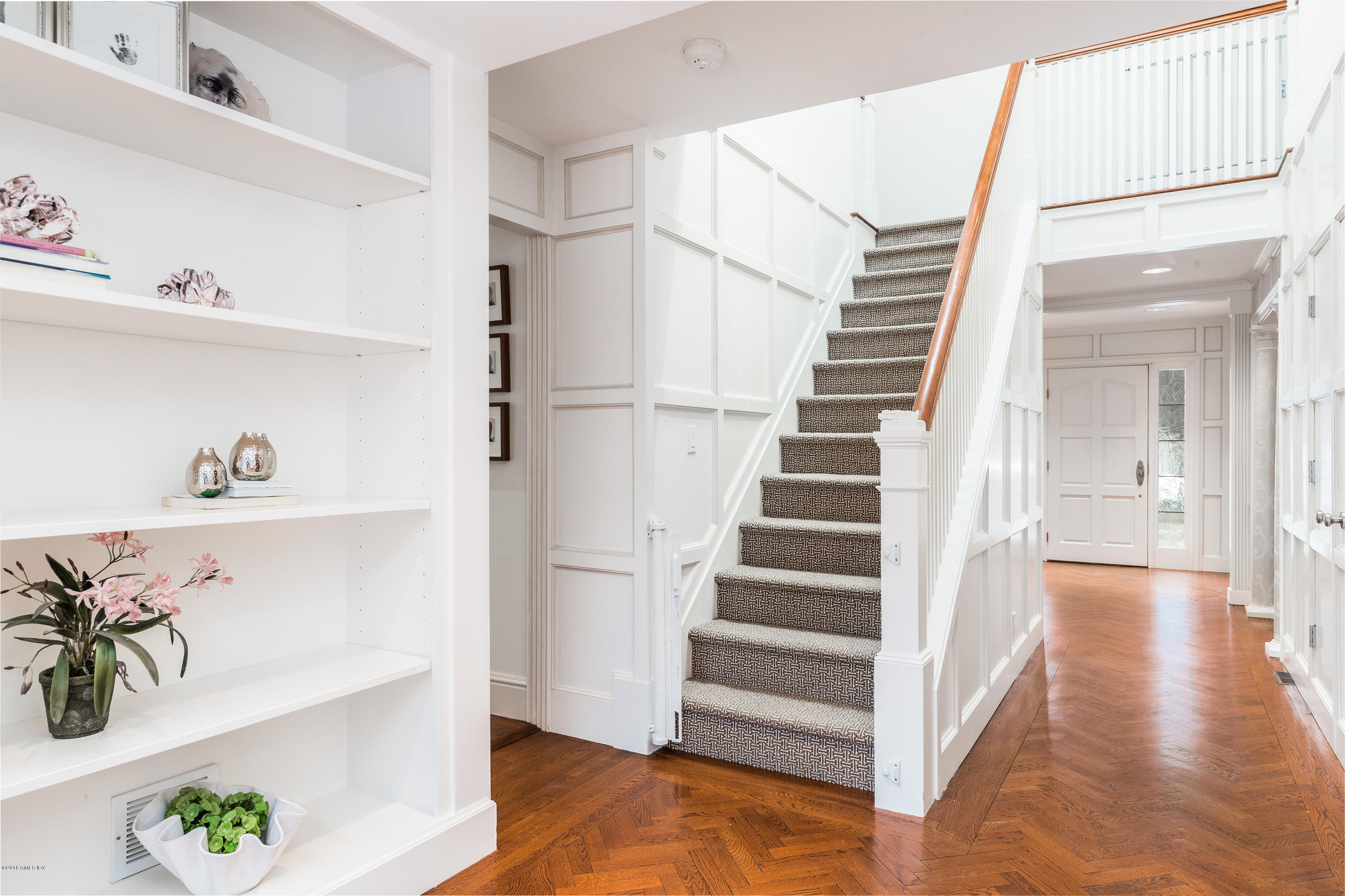 63 Burning Tree Road Greenwich, CT 06830 - Photo 18 of 40 a view of entryway with stairs and wooden floor