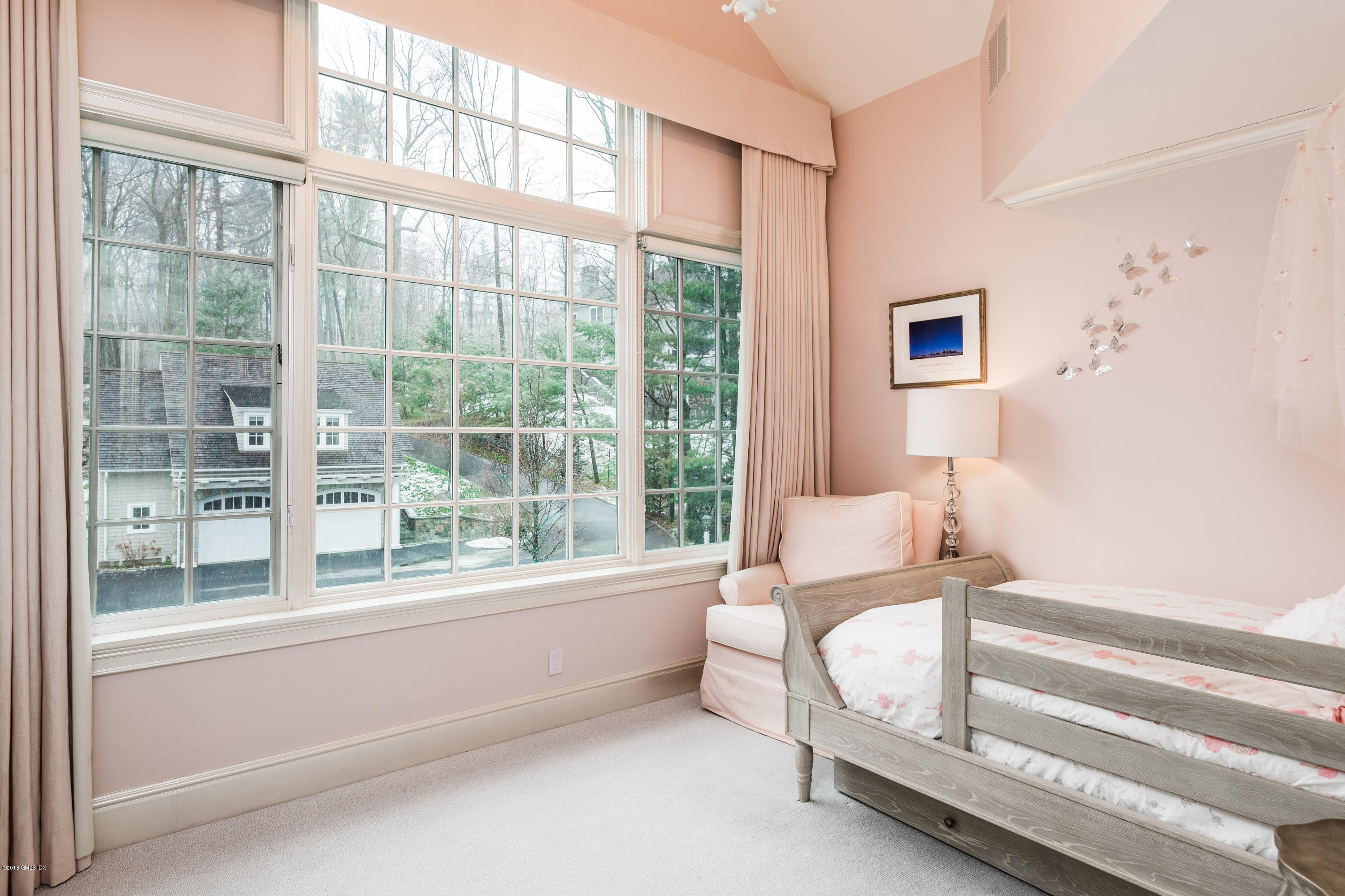 63 Burning Tree Road Greenwich, CT 06830 - Photo 24 of 40 a living room with furniture and a window