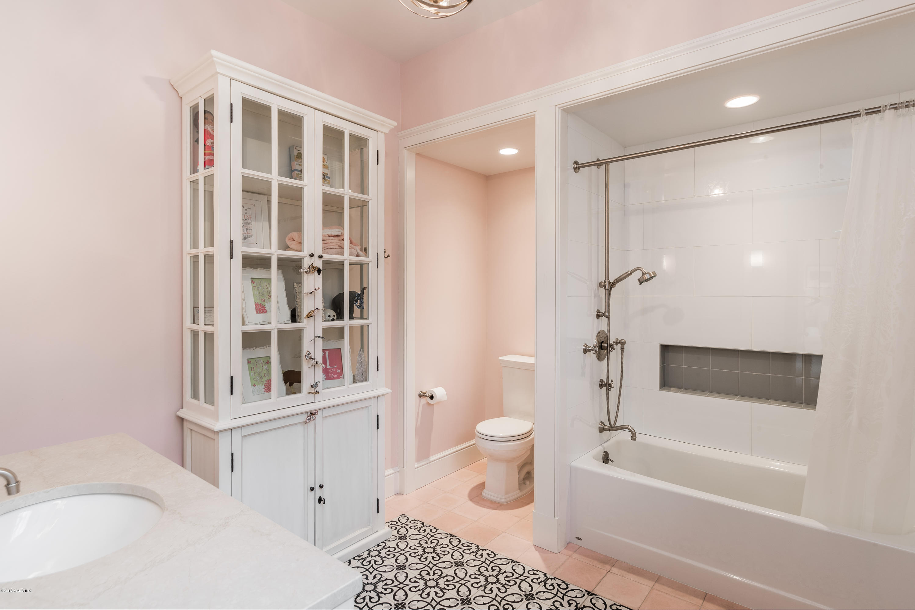 63 Burning Tree Road Greenwich, CT 06830 - Photo 25 of 40 a bathroom with a bathtub toilet and shower