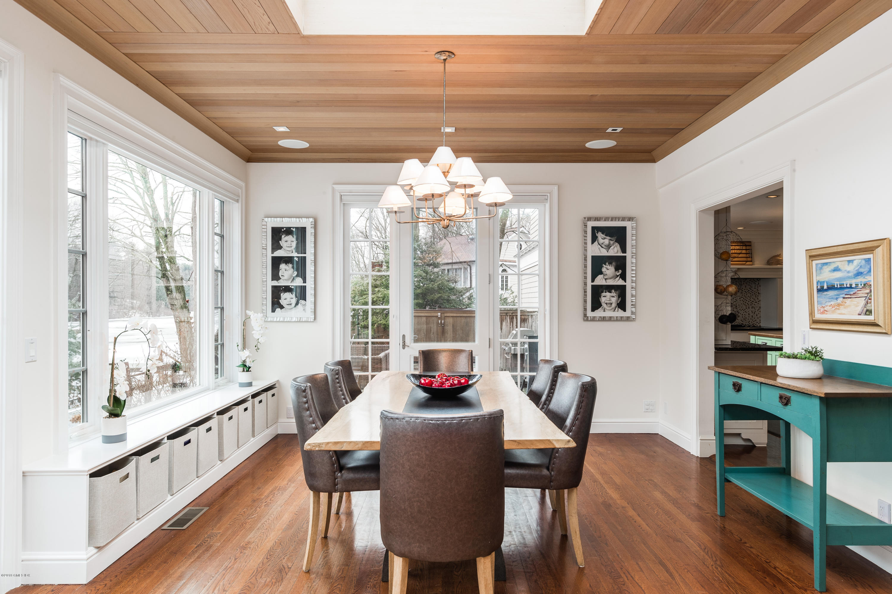 63 Burning Tree Road Greenwich, CT 06830 - Photo 8 of 40 a dining room with furniture window wooden floor