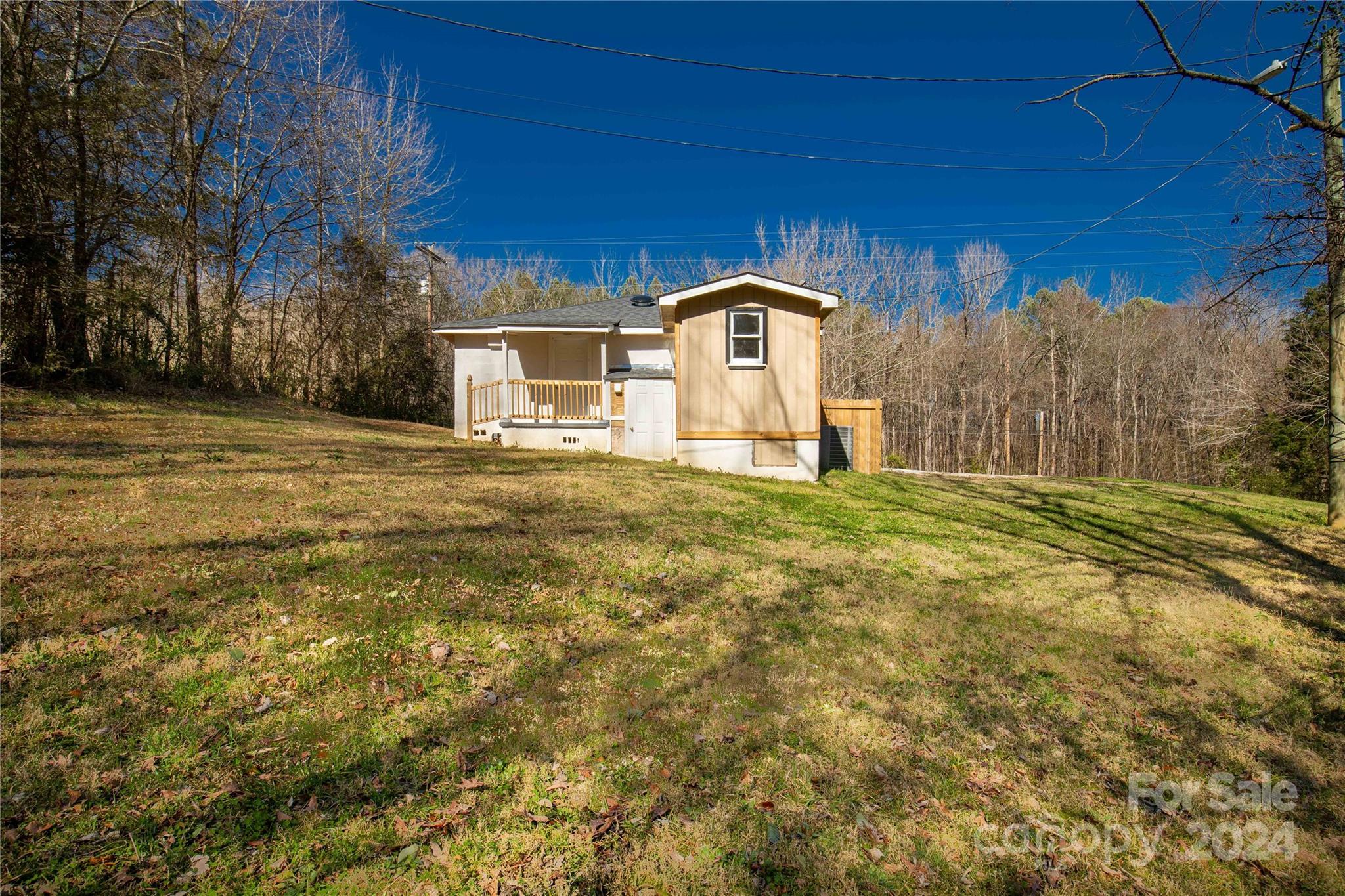 1439 Old Landsford Road Lancaster, SC 29720 - Photo 19 of 21 a front view of a house with a yard