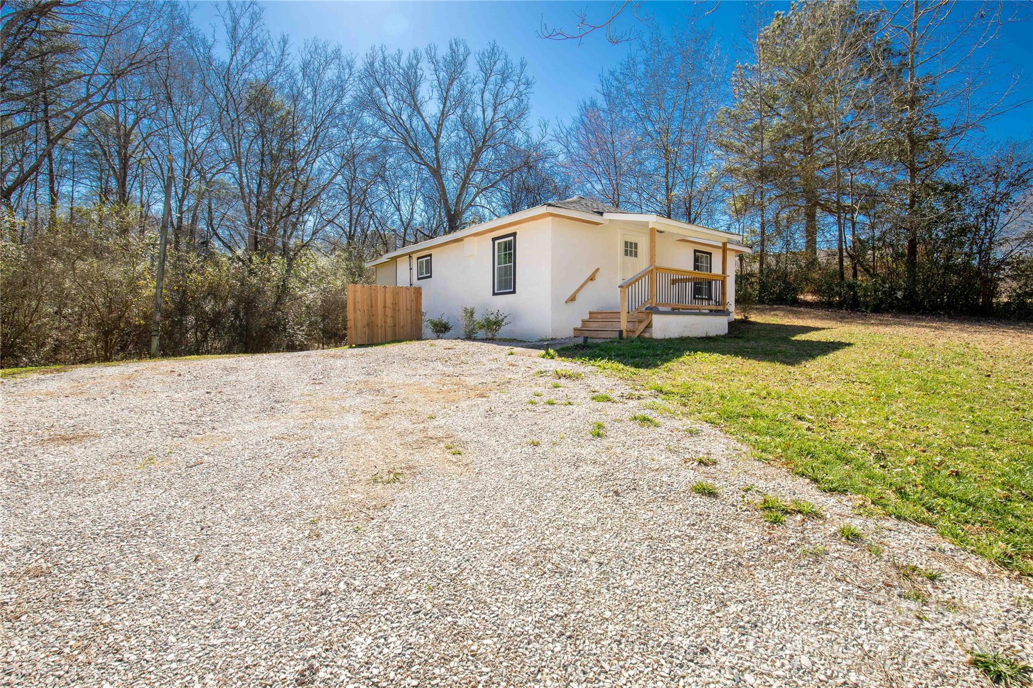 1439 Old Landsford Road Lancaster, SC 29720 - Photo 2 of 21 a white house that has a tree in front of it