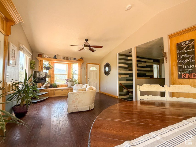 425 East Mule Deer Road Central, UT 84722 - Photo 5 of 72 Living room with vaulted ceiling, ceiling fan, dark wood finished floors, and baseboards