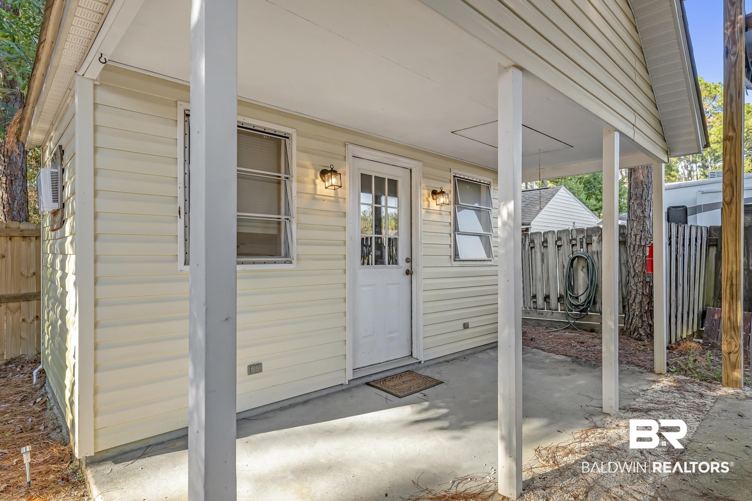 182 Defuniak Loop Lillian, AL 36549 - Photo 10 of 21 View of porch