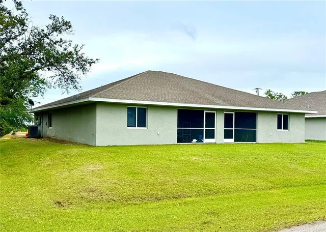 a front view of house with an outdoor seating
