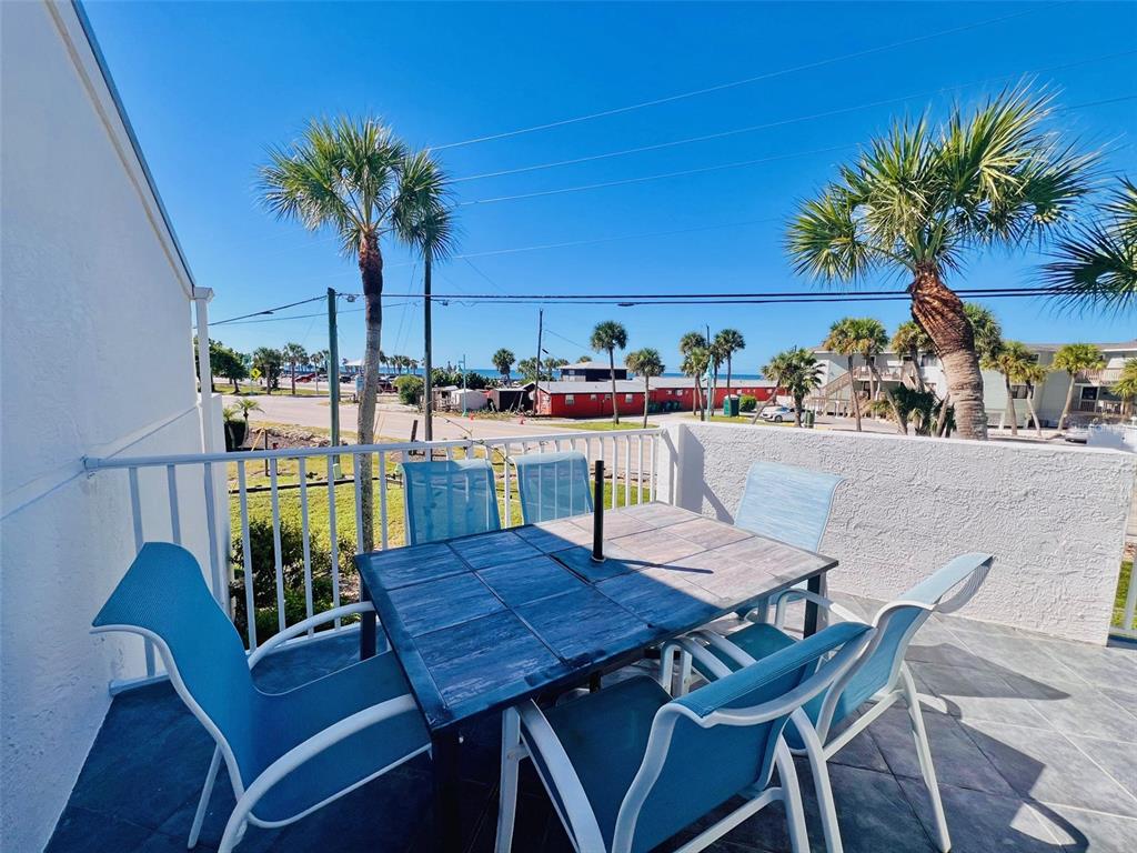 2255 North Beach Road, Unit 13 Englewood, FL 34223 - Photo 11 of 69 a view of a outdoor seating area