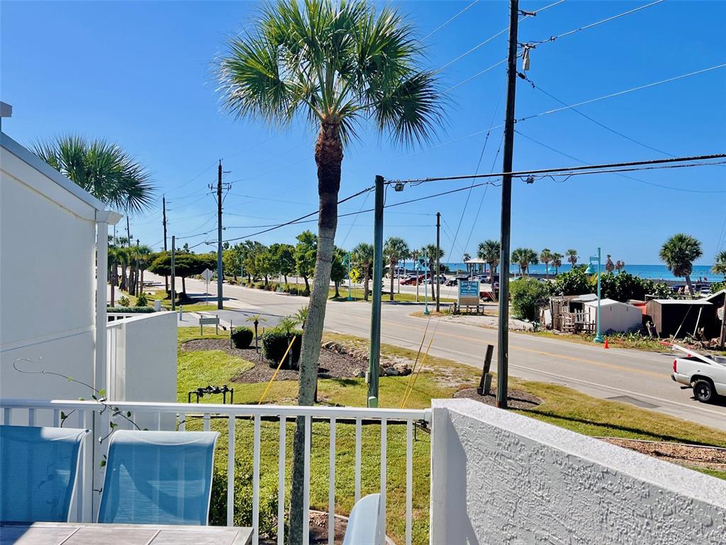 2255 North Beach Road, Unit 13 Englewood, FL 34223 - Photo 13 of 69 a view of a swimming pool with a patio