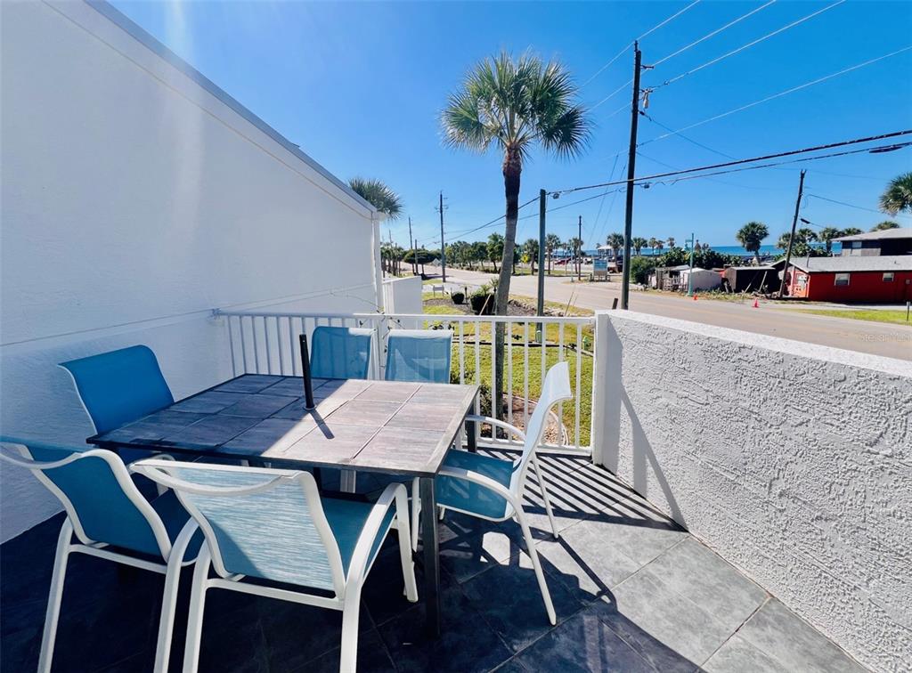 2255 North Beach Road, Unit 13 Englewood, FL 34223 - Photo 14 of 69 a view of a outdoor seating area