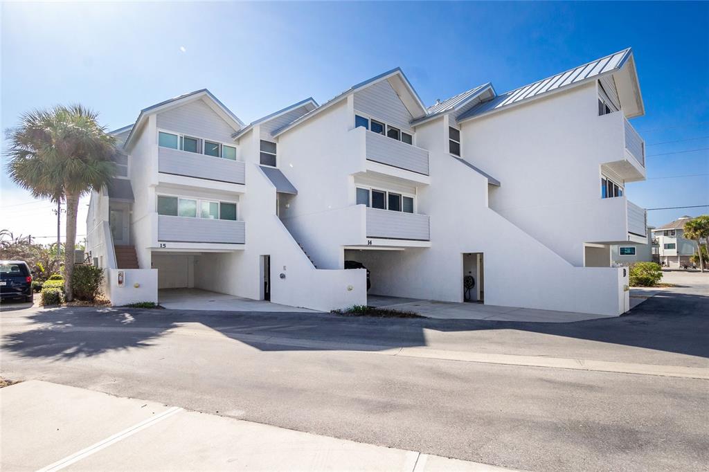 2255 North Beach Road, Unit 13 Englewood, FL 34223 - Photo 38 of 69 a view of a house with a patio