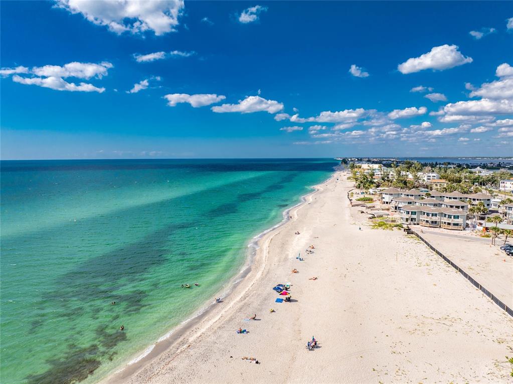 2255 North Beach Road, Unit 13 Englewood, FL 34223 - Photo 65 of 69 a view of a big yard with swimming pool