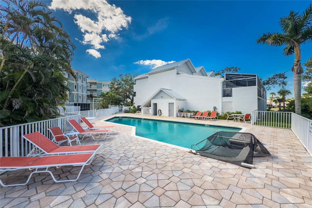 2255 North Beach Road, Unit 13 Englewood, FL 34223 - Photo 69 of 69 a view of a chairs and table in the patio