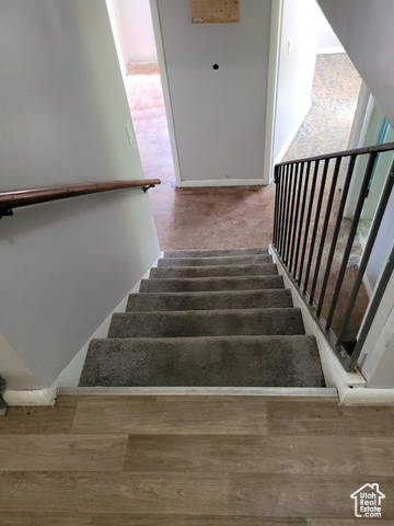 360 West 200 North Logan, UT 84321 - Photo 19 of 26 Stairs to 1st level basement