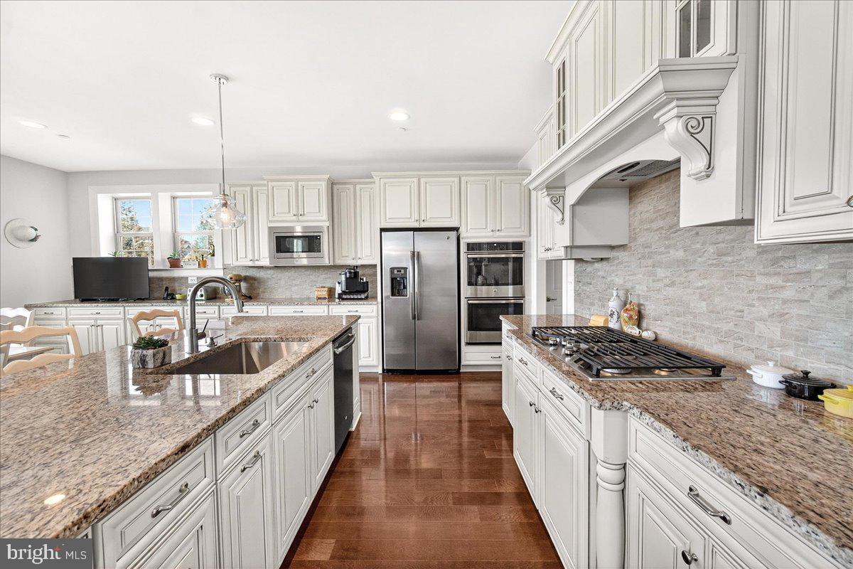 21217 Cracklin Road Laytonsville, MD 20882 - Photo 22 of 71 Gas range with custom vent hood and double ovens