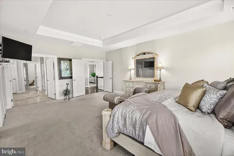 a bathroom with a granite countertop sink a mirror and vanity