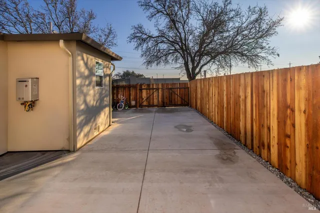 a view of a street with cars