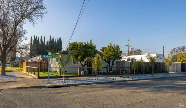 an aerial view of a house with a garden