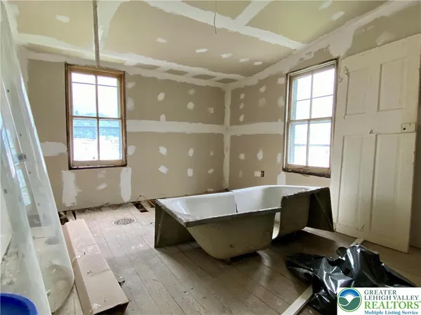 a bathroom with a bathtub
