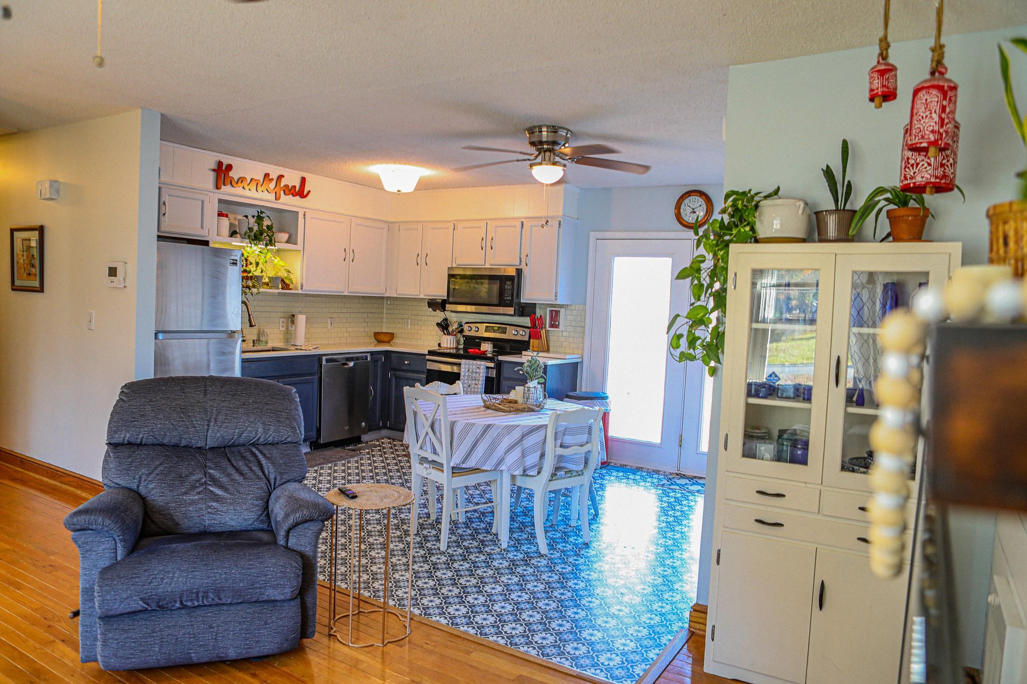 58 Hayrick Road Waynesboro, VA 22980 - Photo 15 of 38 a living room with furniture and a kitchen area
